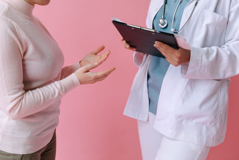 Doctor consulting a patient about Botox injections at a skin clinic in Seoul, Korea