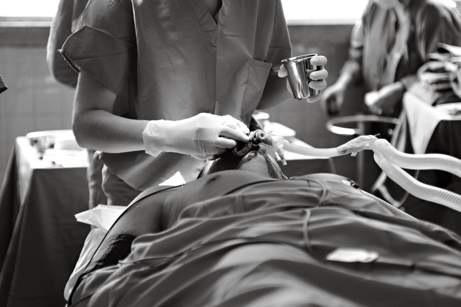 Patient recovering in Korean hospital cardiac ward after congenital heart defect surgery