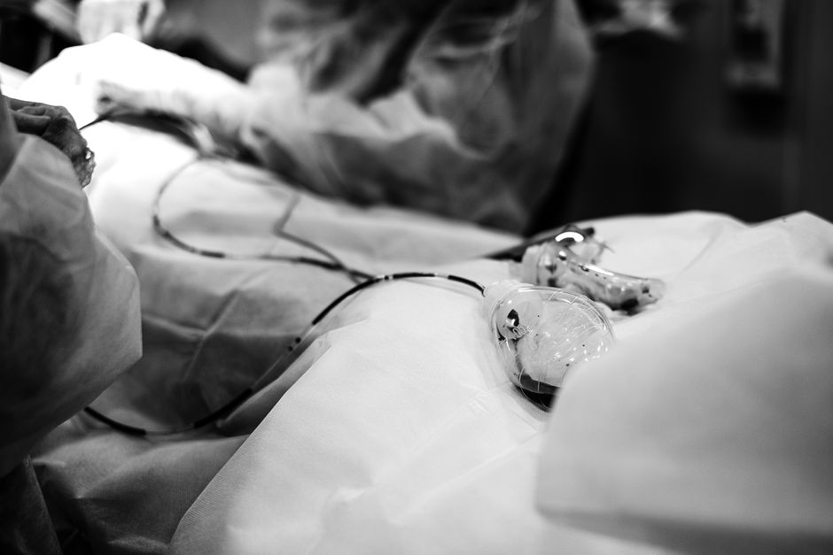 Surgical team performing coronary artery bypass grafting CABG procedure in a Korean hospital operating theatre