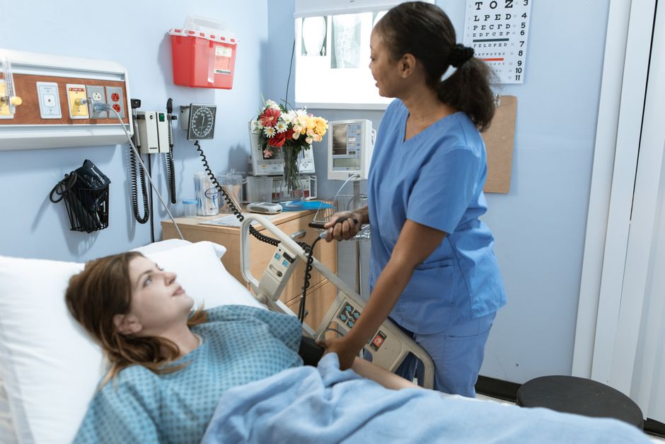 Patient recovering after hemorrhoid surgery with nursing care during the stay in Korea